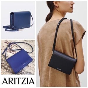 Auxiliary mini leather flag crossbody bag